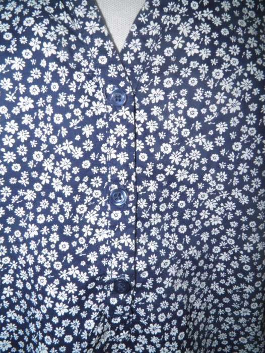 Camisa manga curta, muito feminina e confortável