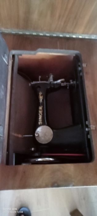 Máquina de costura.64585677306883125