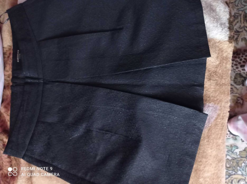 Spódniczka spódnica błyszcząca czarna trapez krótka Reserved 40 - 42