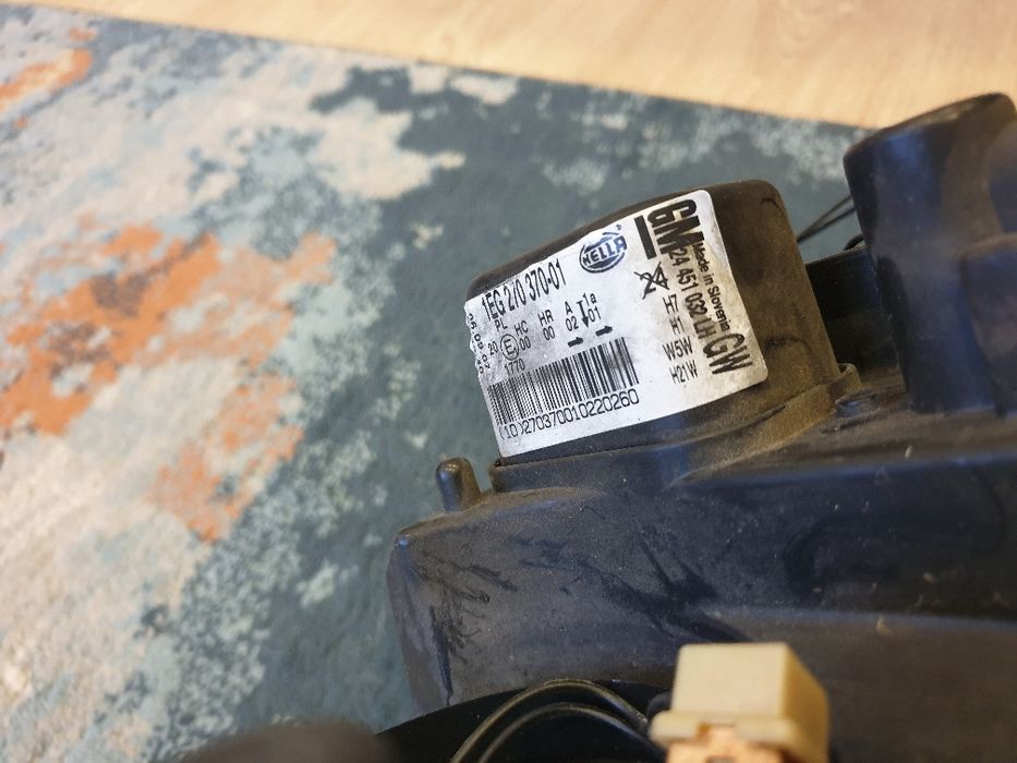 Faróis originais Opel Astra H