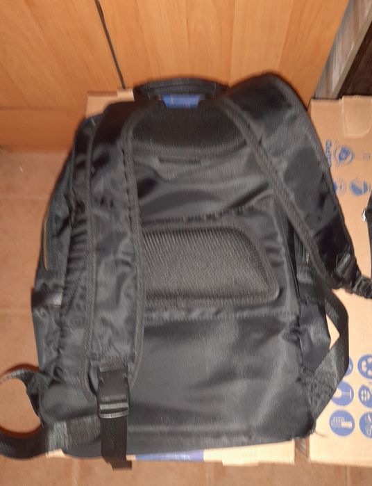 Mochila + bolsa em pele