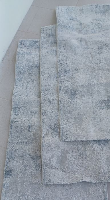 Trio de tapetes de quarto.