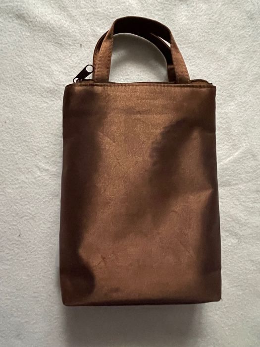 Brązowa, przeźroczysta kosmetyczka - dove