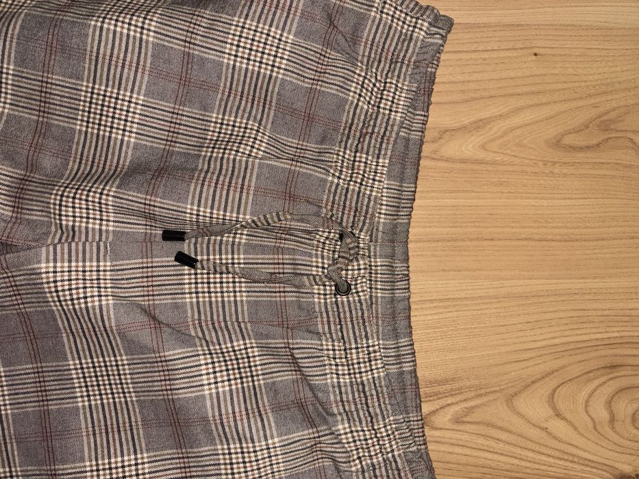 Męskie miękkie spodnie w beżową kratę  Zara  Rozmiar S