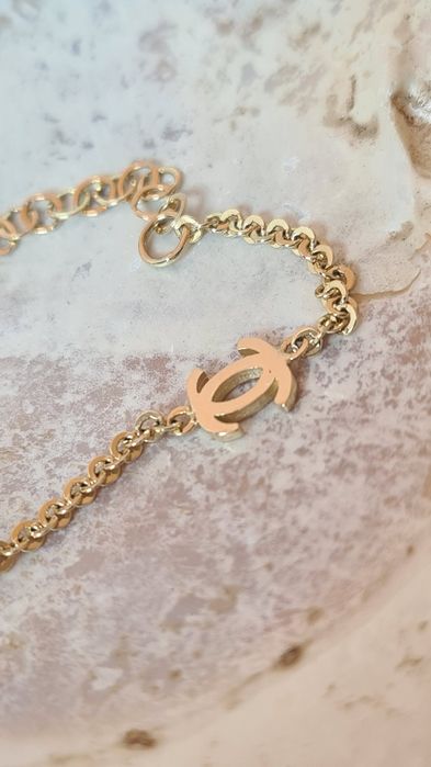 Złota bransoletka typu Chanel CC p. 585