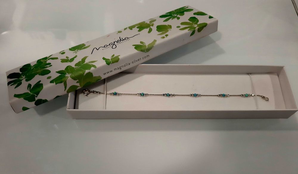 Pulseira em prata com opala azul