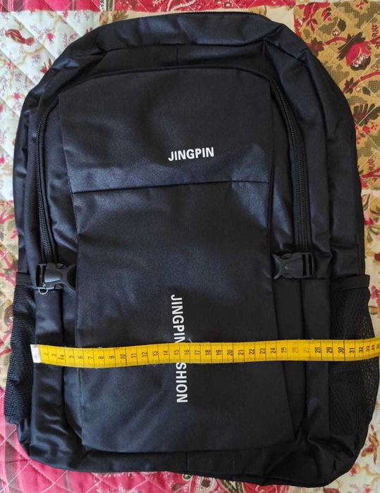 Mochila Preta+12 lápis cera e 12 lápis cor+2 cadernos A4 em oferta!