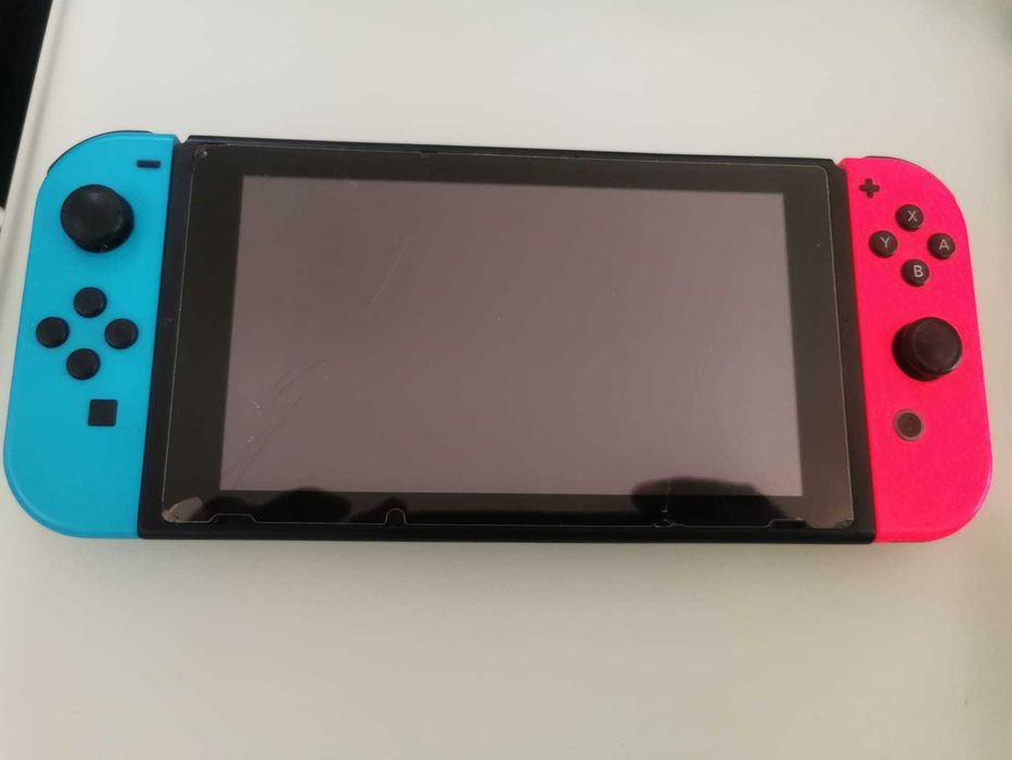 Nintendo Switch completa na caixa com 2 Jogos