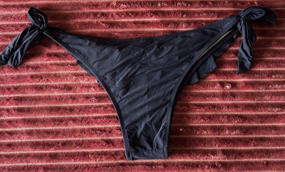 Cueca de biquíni azul com laços