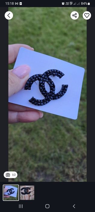 Czarna broszka cc z cyrkoniami