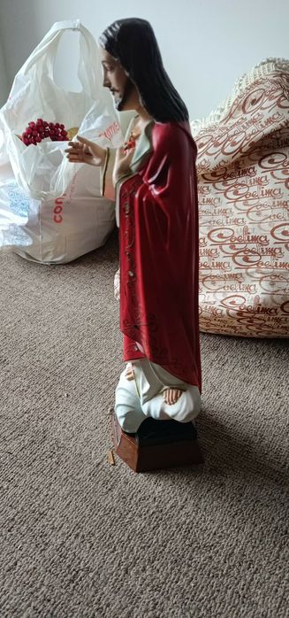 Imagem coração segurado Jesus" olhos em vidro"