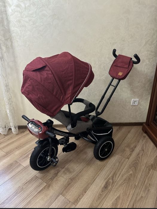 Триколісний велосипед з батьківською ручкою