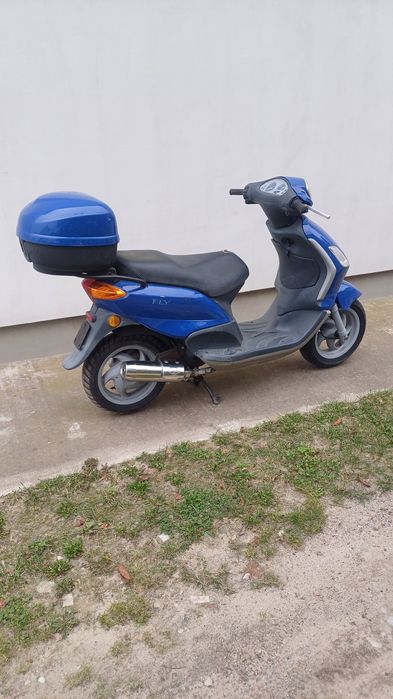 Piaggio FLY 50 części kufer,wydech,lampa,pokrywa,stelaż,wał,błotnik,