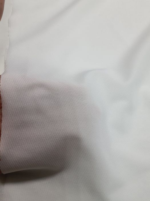 Tkanina biała cieńsza z elastanem szer.170 cm.