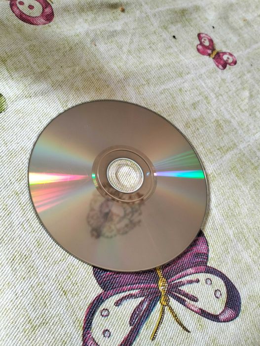 PlayStation 2 com comando e 2 jogos