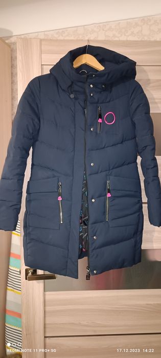 Женский пуховик.