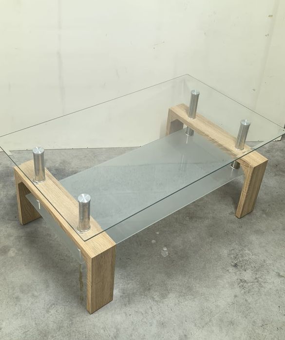 Belíssima mesa de centro Missouri Cambrian, pé em madeira e vidro.
Ler