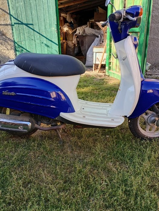 Скутер  Сузукі верде