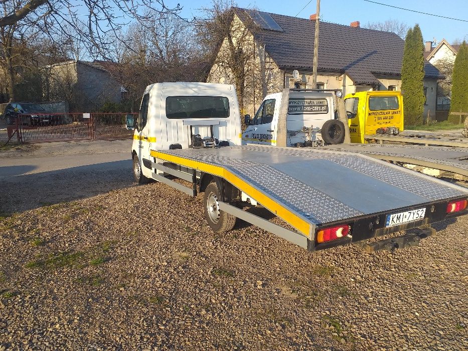 Autolaweta  Pomoc Drogowa laweta wypożyczalnia wynajem bus Holowanie