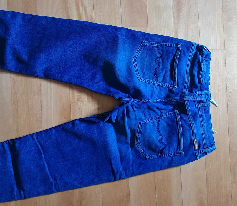 Spodnie jeansowe Smyk r.164