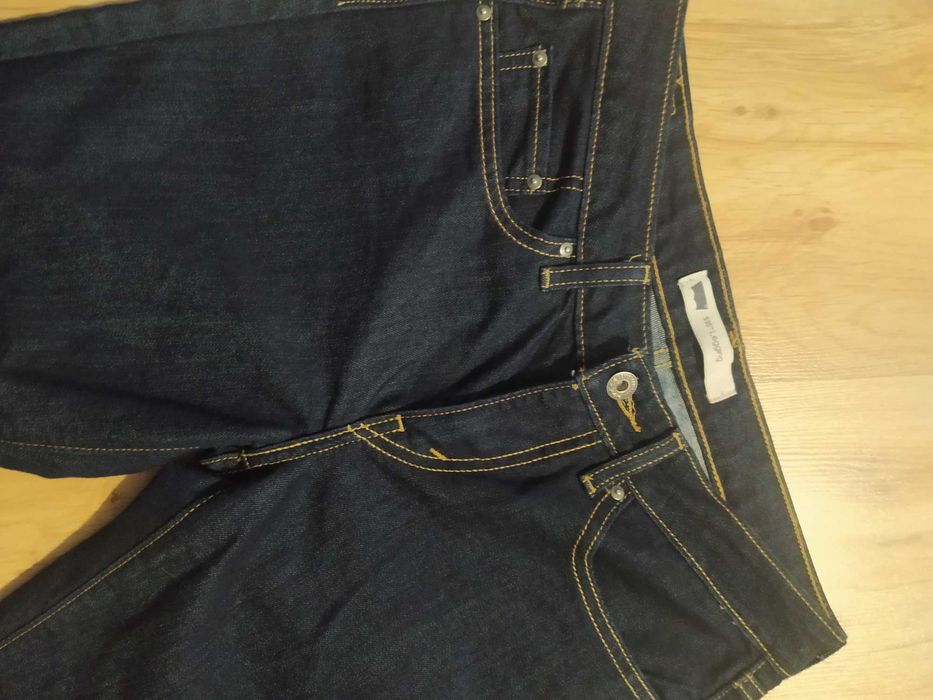 Granatowe damskie jeansy Levi's legging 30/32