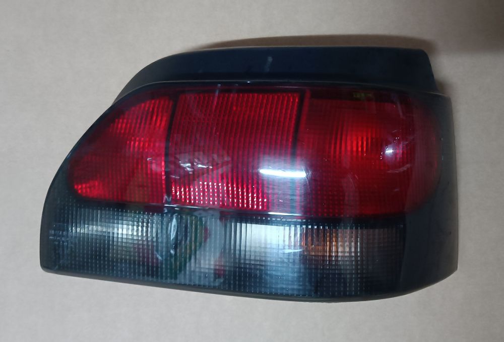 Farol Frente Esquerdo  e Farolim traseiro Direito Renault Clio 1