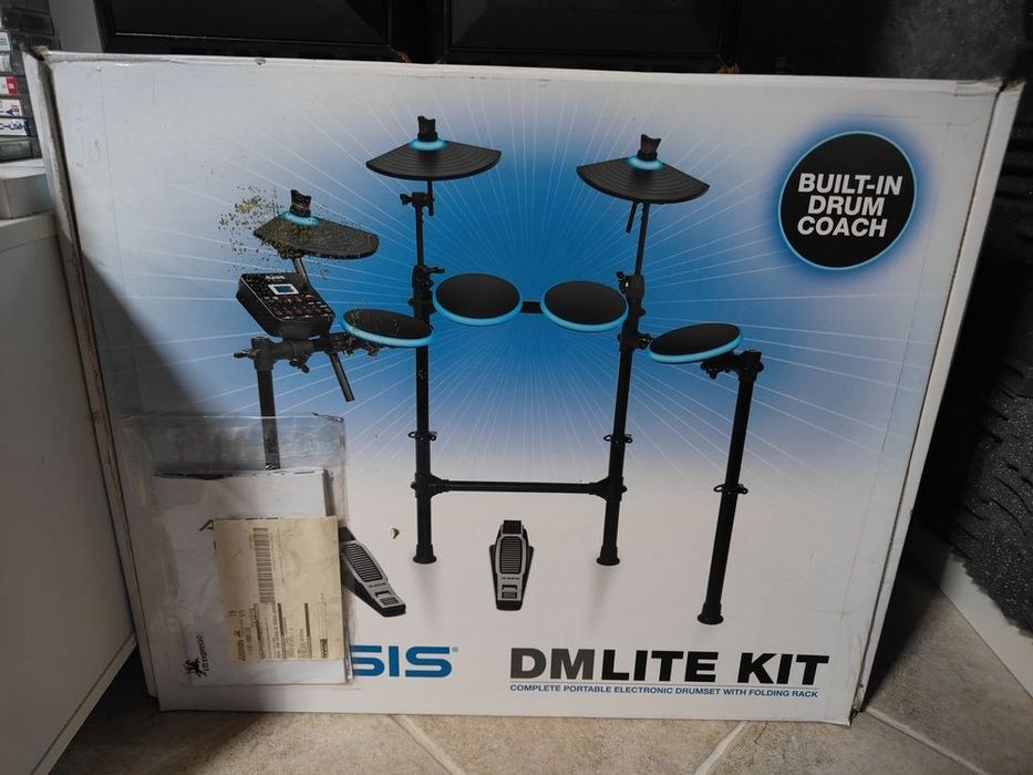Bateria Eletrónica Alesis DM Lite Kit – Completa com Banco + baquetas.