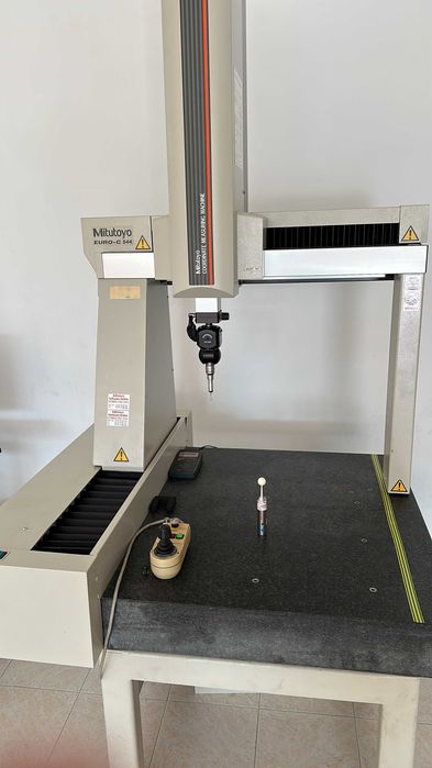 Maquina de medição e de aumento
