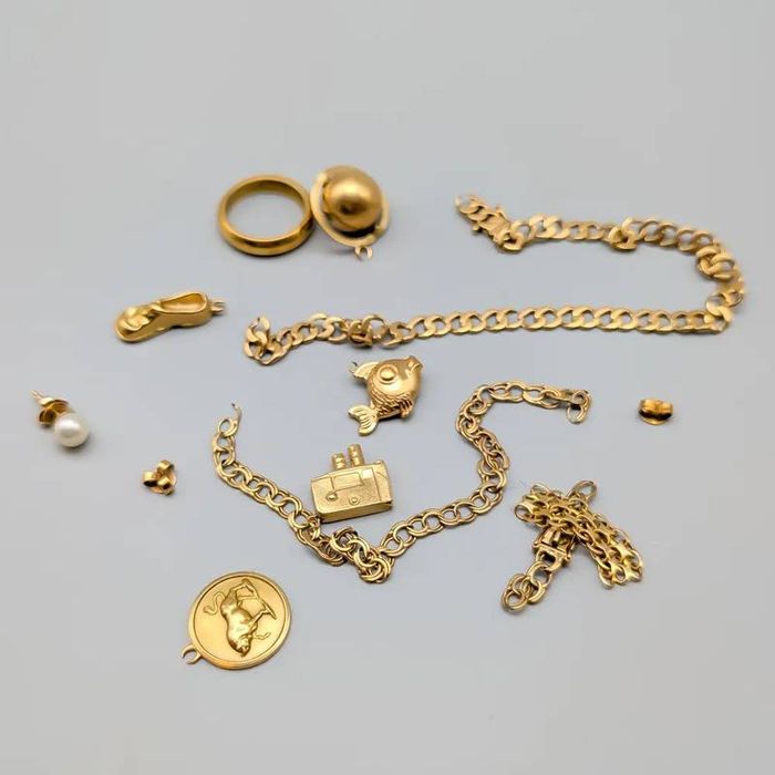 Lote de ouro 18 quilates 30.79 gramas