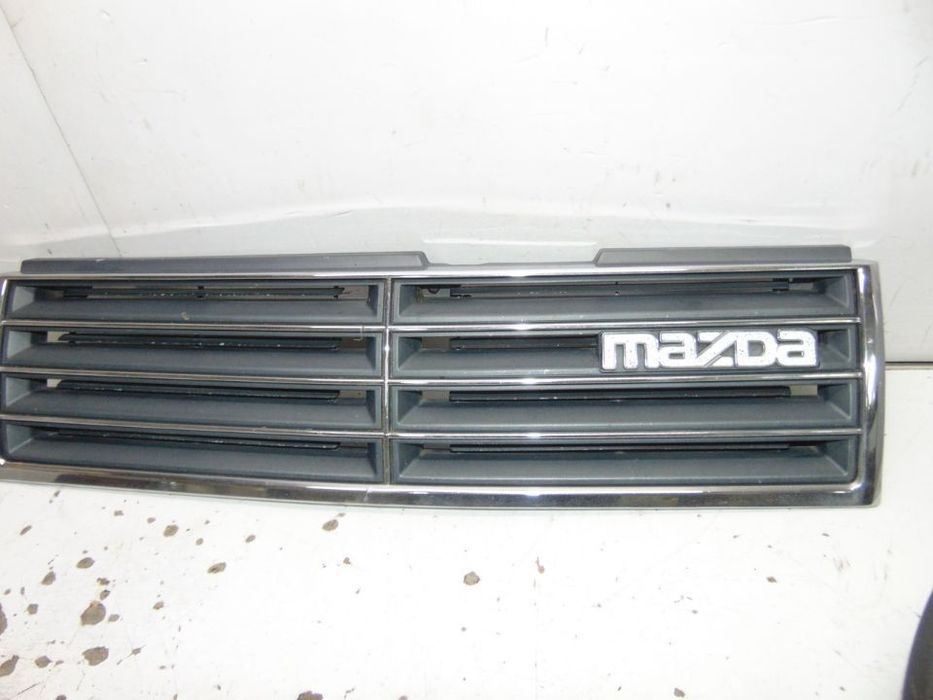 Mazda 929 grelha/Volante