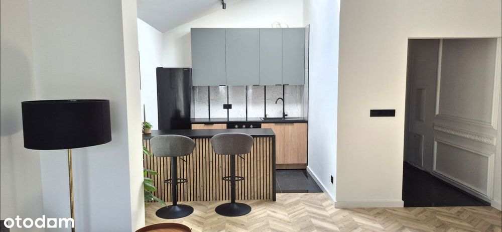WYJĄTKOWY APARTAMENT z ogródkiem i przestronnym tarasem.