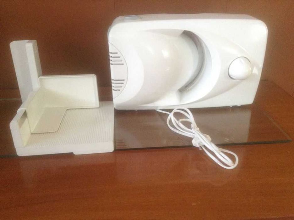 Krajalnica elektryczna do chleba, wędlin,serów itp