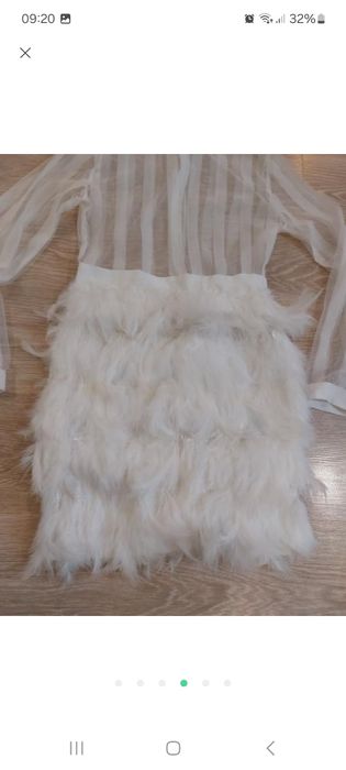 Святкова сукня з пір'ям