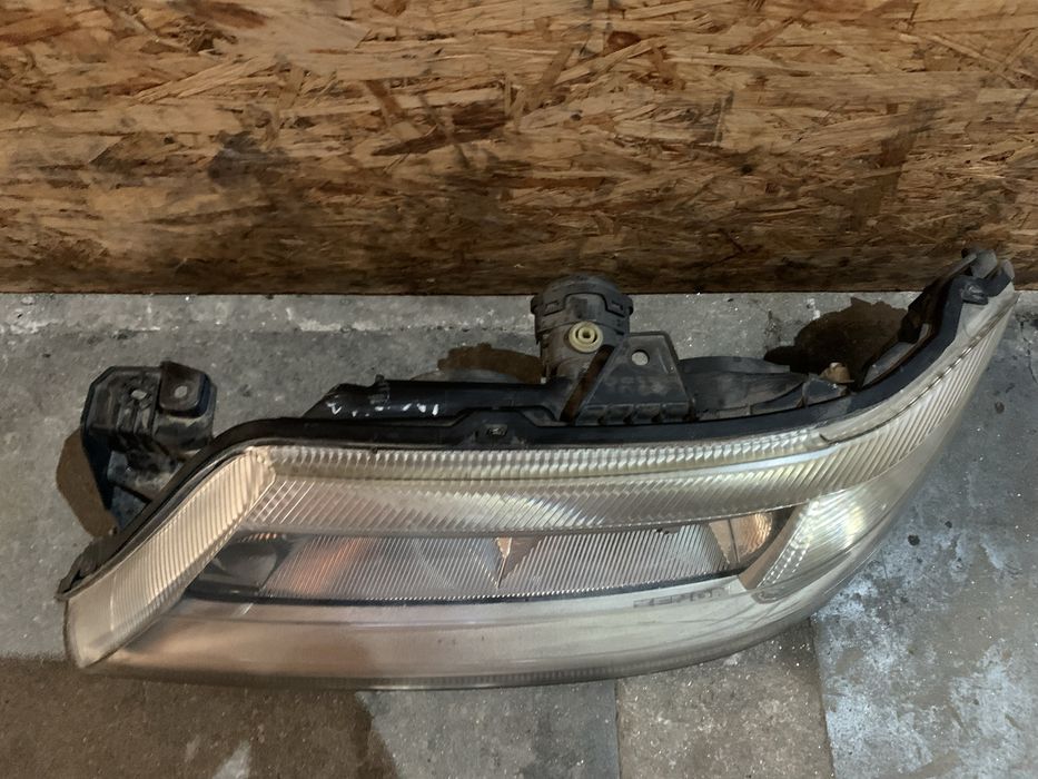 Farol otica lado esquerdo Renault Laguna xenon