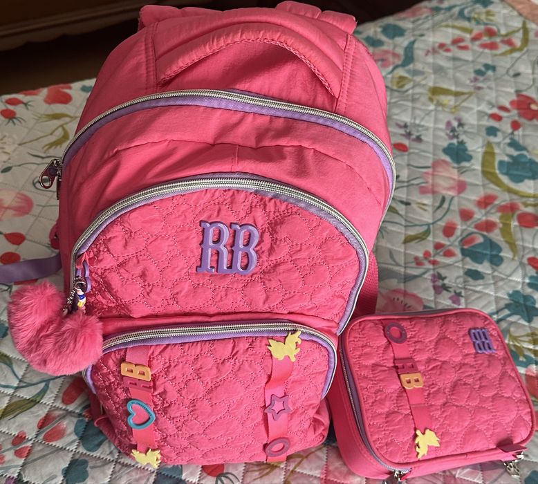 Mochila + estojo RB quase nova
