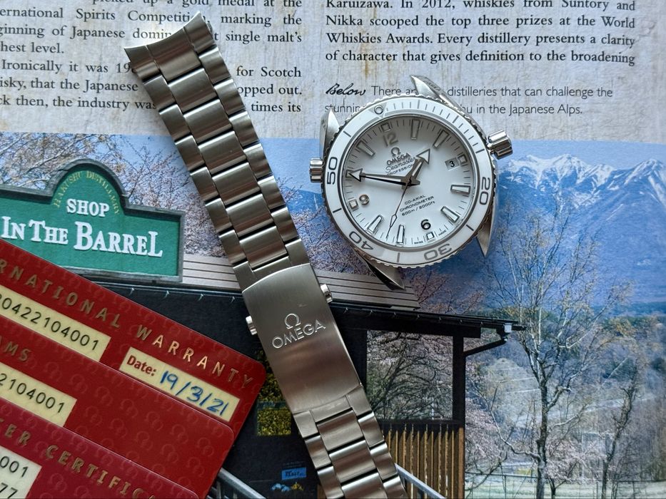 Zegarek Omega Seamaster Planet Ocean 42 mm White Polar - Idealny