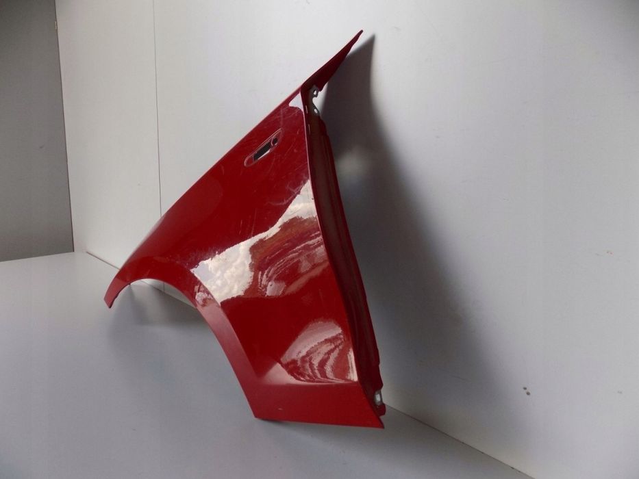 BMW 1 E87 E88 błotnik Lewy (A75 czerwony) - 0611