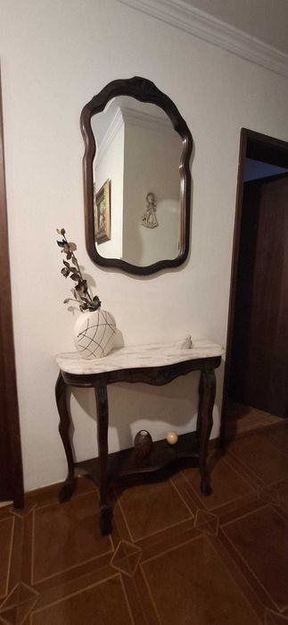 Sala de estar com boa apresentação e boas condições