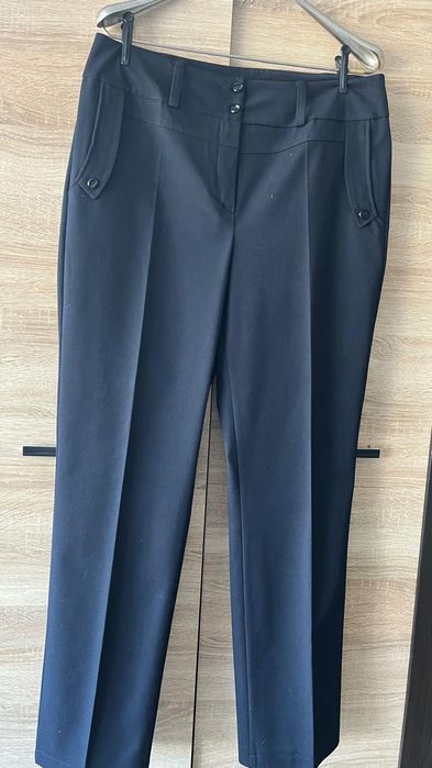 Одяг для жінки .