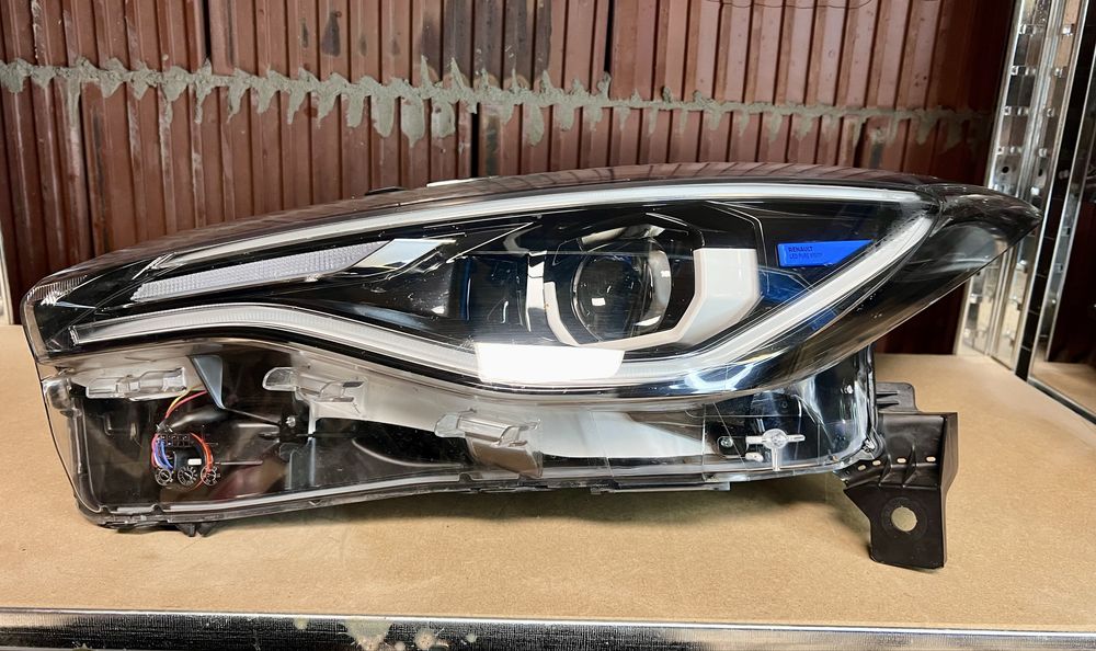 Renault Zeo lift lampa reflektor lewy