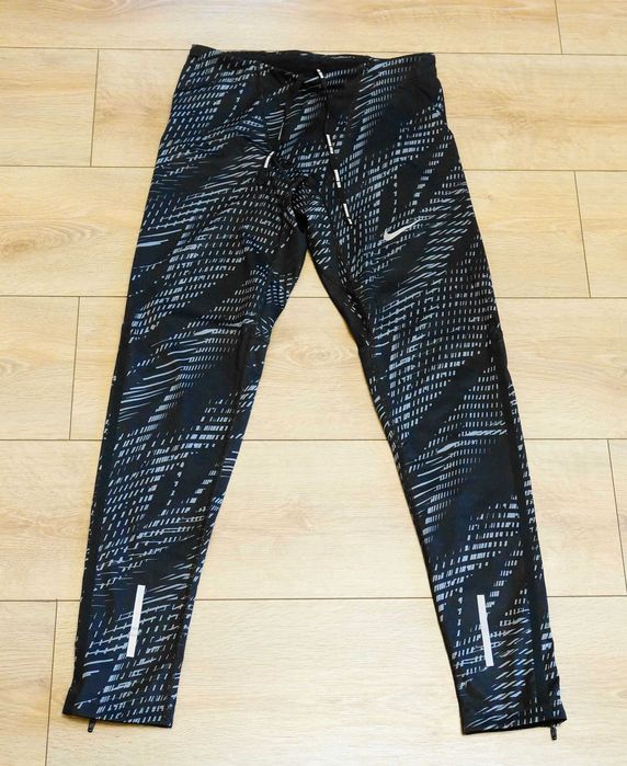 Мужские беговые тайтсы nike power tech оригинал.