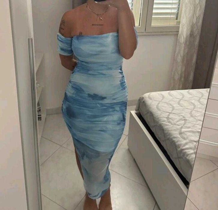Elegancka sukienka midi z odkrytymi ramionami
