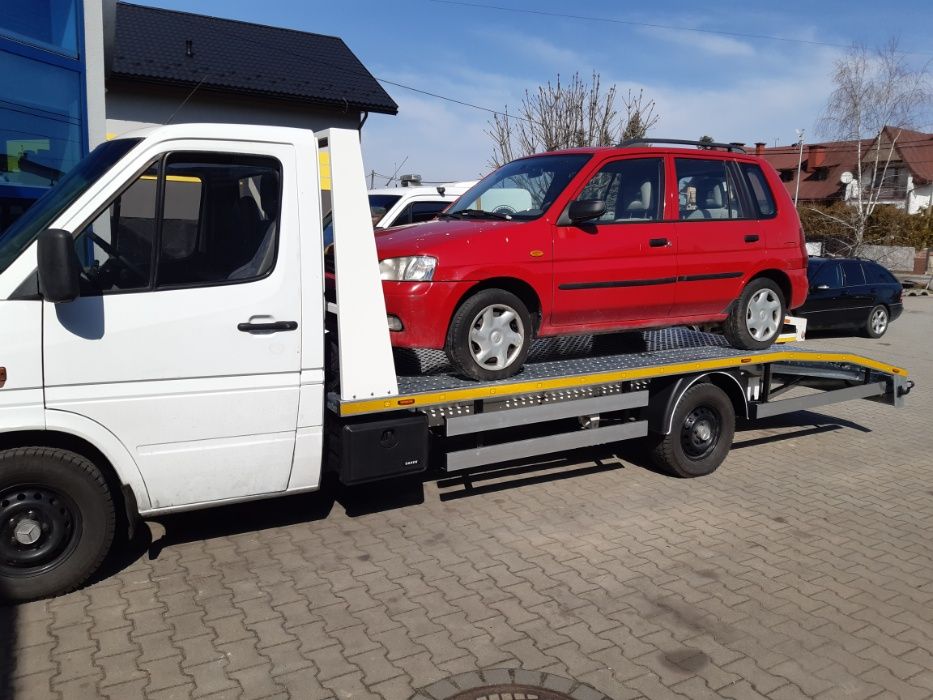 Wynajem wypożyczenie autolaweta laweta pomoc drogowa .