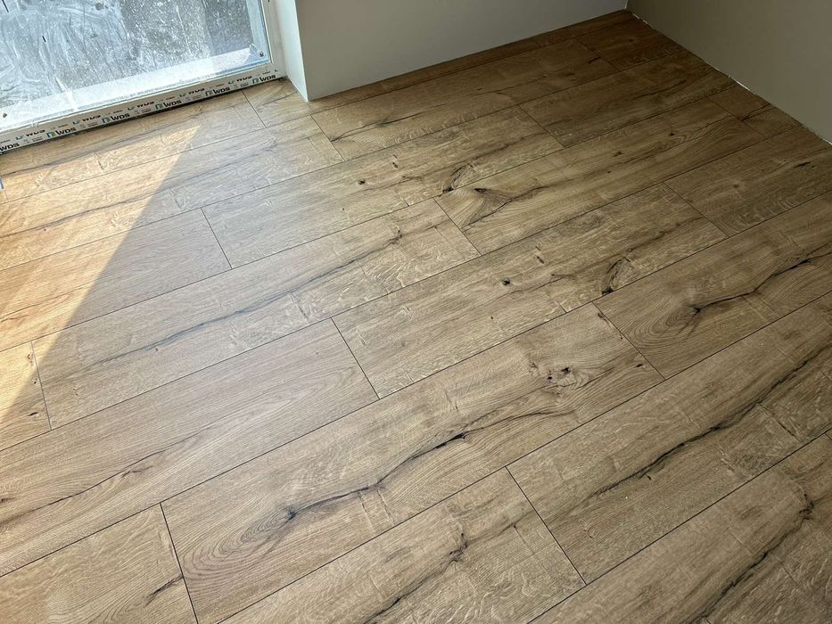 Укладка ламінату Монтаж плінтуса Мдф Паркетна дошка Укладання ламінату