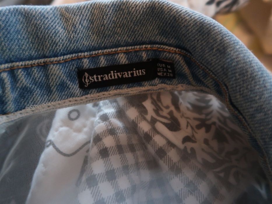 Casaco de ganga com transparências nos ombros