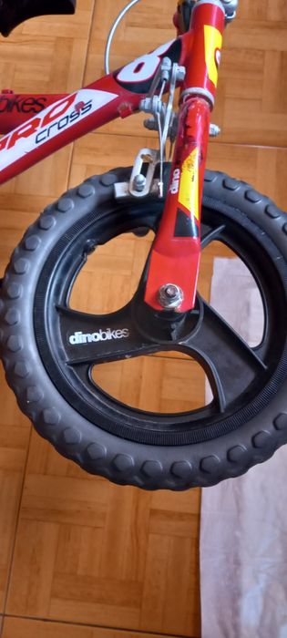 Bicicleta dino para criança