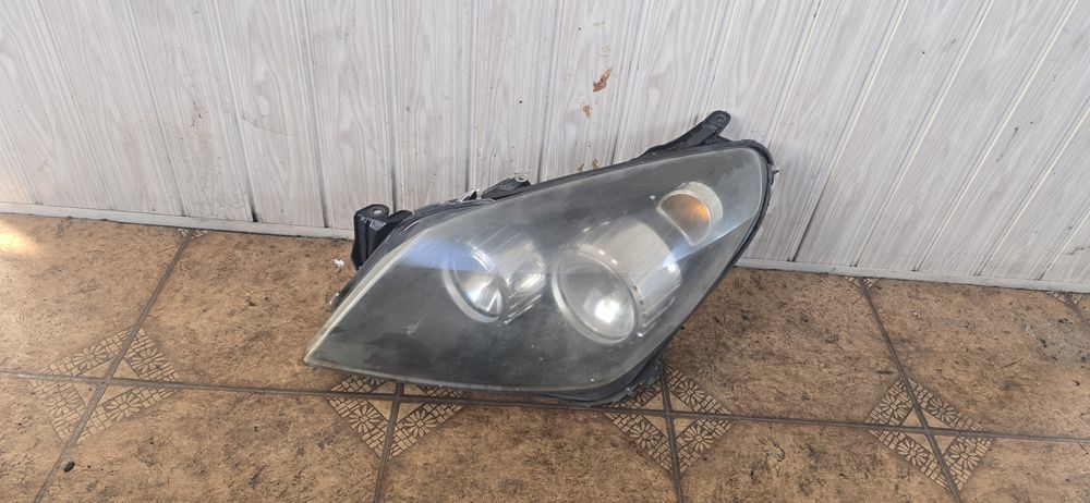 Lampa  lewa Opel Astra H