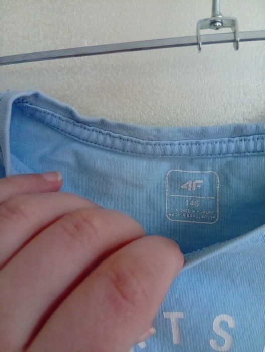 Niebieski t-shirt 4F i kolarki Cinnamoroll 146