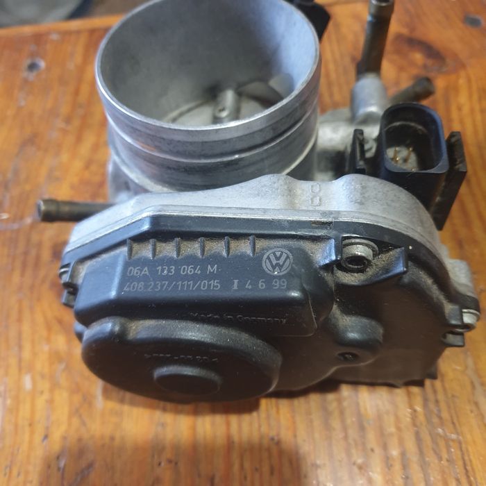 Дроссельний вузол для автомобілів групи VAG