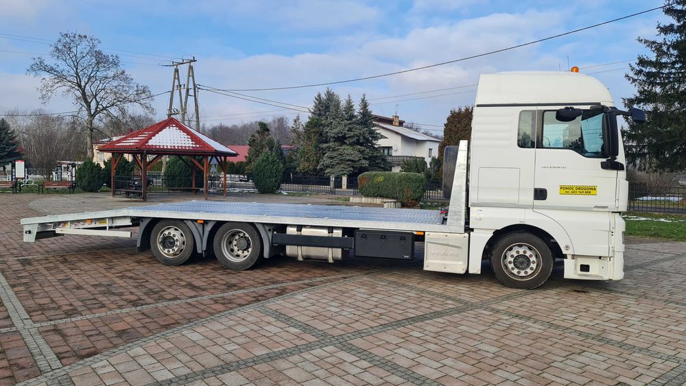 Najazd platforma ciężarowe trzyośka zabudowa laweta MAN TGM Hydraulika